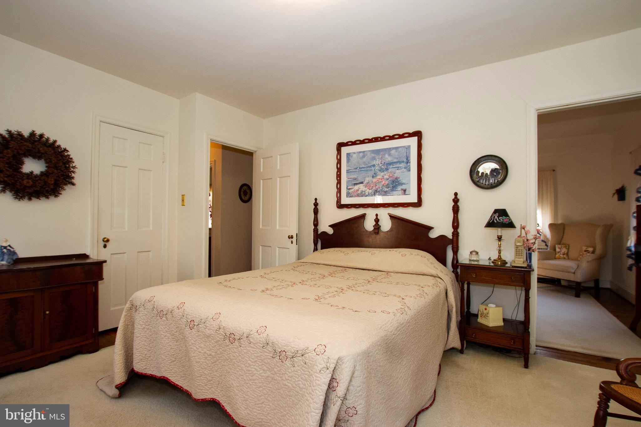 7103 Sheffield Road Baltimore, MD 21212 - Photo 27 of 37 a bed room with a bed and a lamp