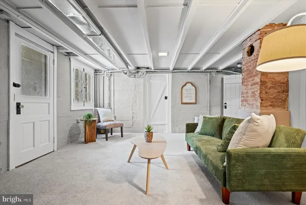 a kitchen with a refrigerator sink and cabinets