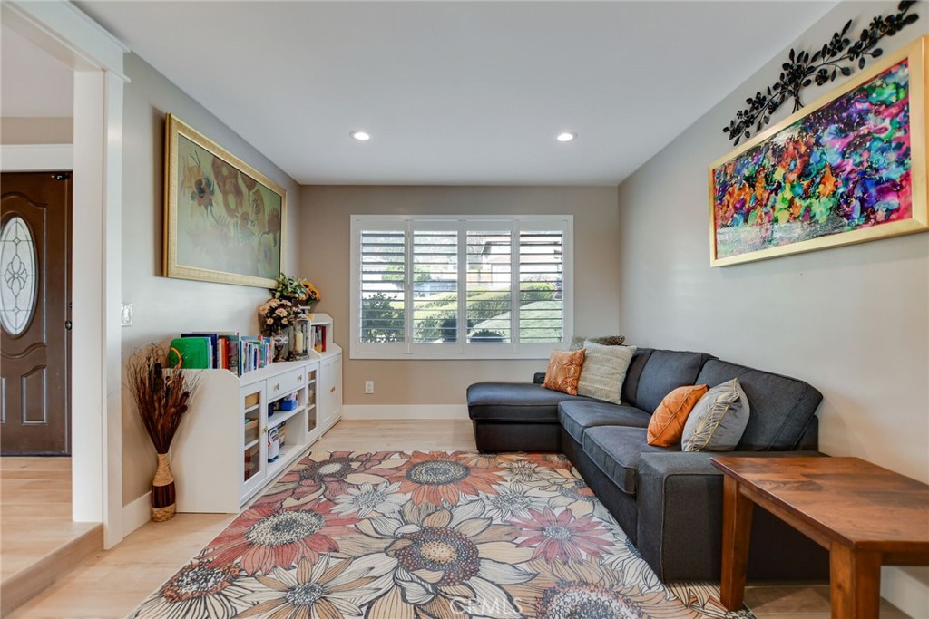 8317 La Senda Road Rancho Cucamonga, CA 91701 - Photo 13 of 75 a living room with furniture and a large window