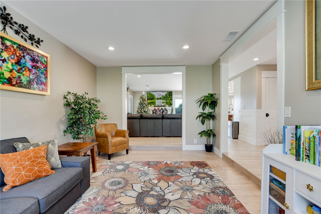 8317 La Senda Road Rancho Cucamonga, CA 91701 - Photo 14 of 75 a living room with furniture and a potted plant