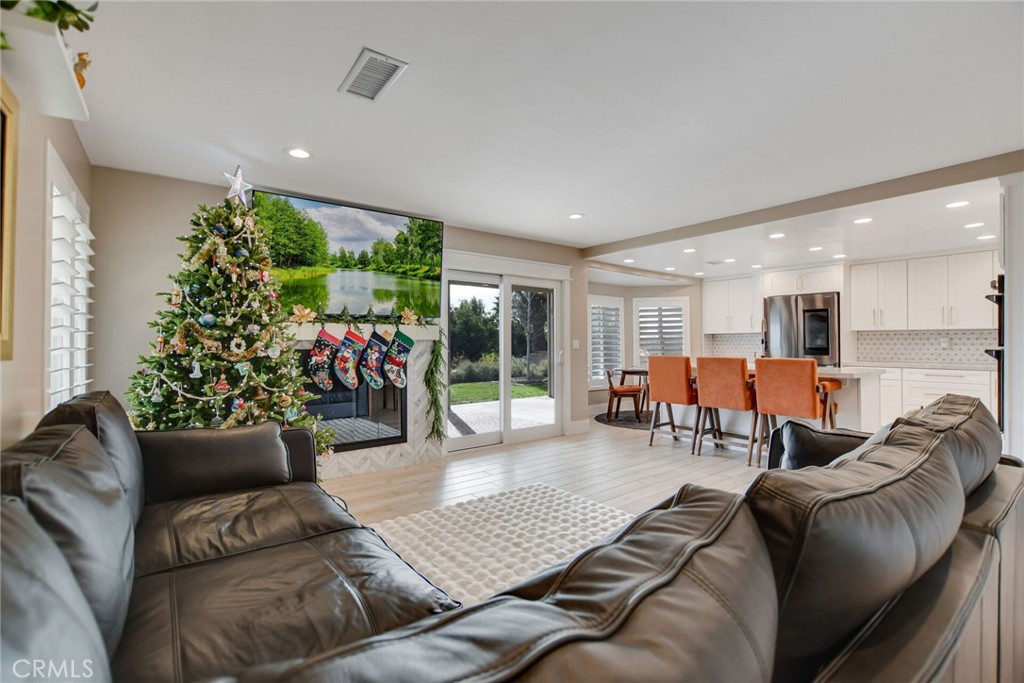 8317 La Senda Road Rancho Cucamonga, CA 91701 - Photo 19 of 75 a living room with furniture and a large window