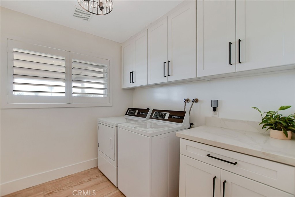 8317 La Senda Road Rancho Cucamonga, CA 91701 - Photo 31 of 75 a utility room with closet dryer and washer