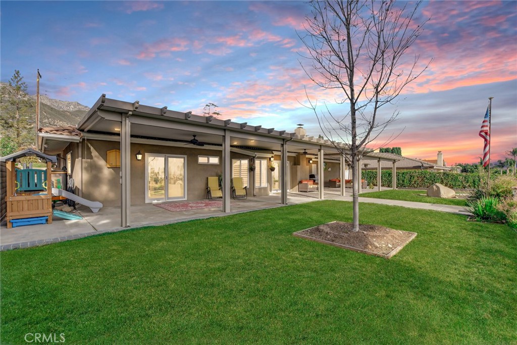 8317 La Senda Road Rancho Cucamonga, CA 91701 - Photo 42 of 75 a view of a house with a backyard