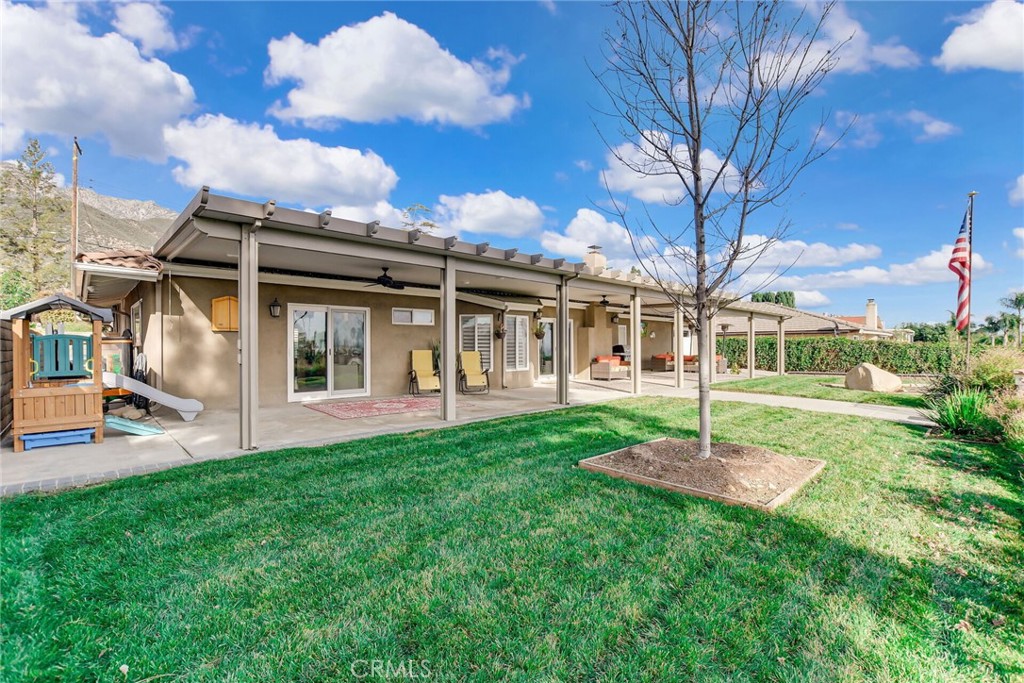8317 La Senda Road Rancho Cucamonga, CA 91701 - Photo 44 of 75 a front view of a house with a garden