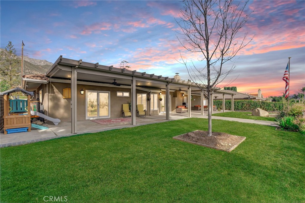 8317 La Senda Road Rancho Cucamonga, CA 91701 - Photo 5 of 75 a view of a house with a backyard