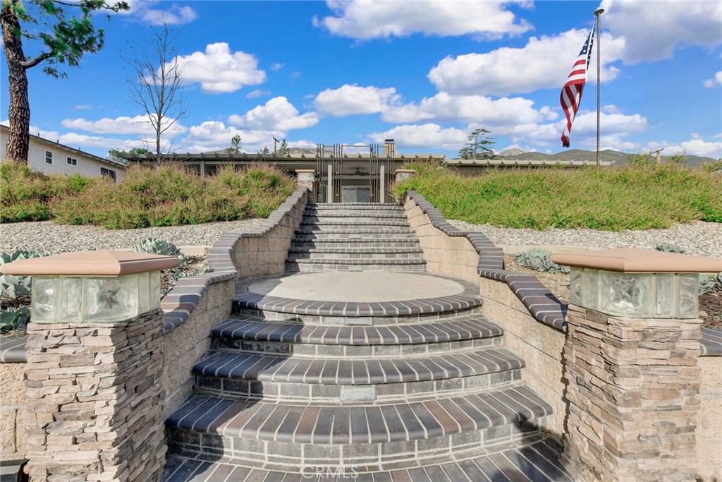 8317 La Senda Road Rancho Cucamonga, CA 91701 - Photo 53 of 75 a view of a white building with a yard