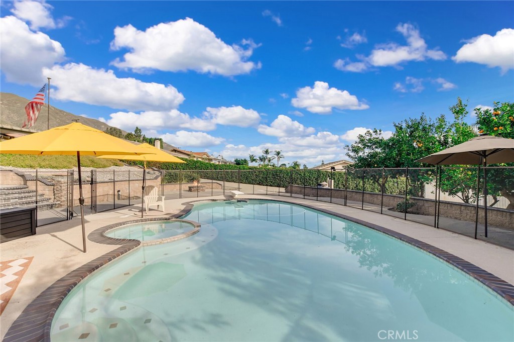 8317 La Senda Road Rancho Cucamonga, CA 91701 - Photo 57 of 75 a view of a swimming pool with a lounge chair