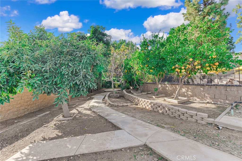 8317 La Senda Road Rancho Cucamonga, CA 91701 - Photo 67 of 75 a backyard of a house with lots of green space
