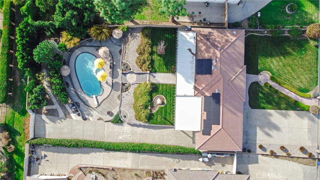8317 La Senda Road Rancho Cucamonga, CA 91701 - Photo 73 of 75 an aerial view of a house with garden space and a car park side of the road