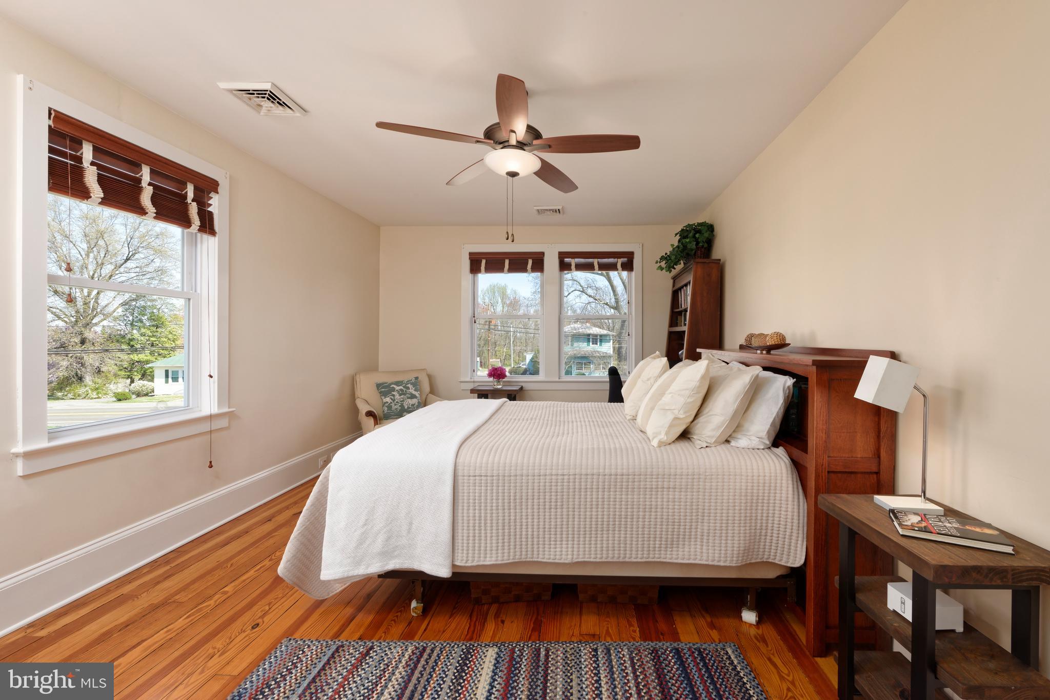 4048 Rectortown Road Marshall, VA 20115 - Photo 22 of 52 a bedroom with a bed and wooden floor