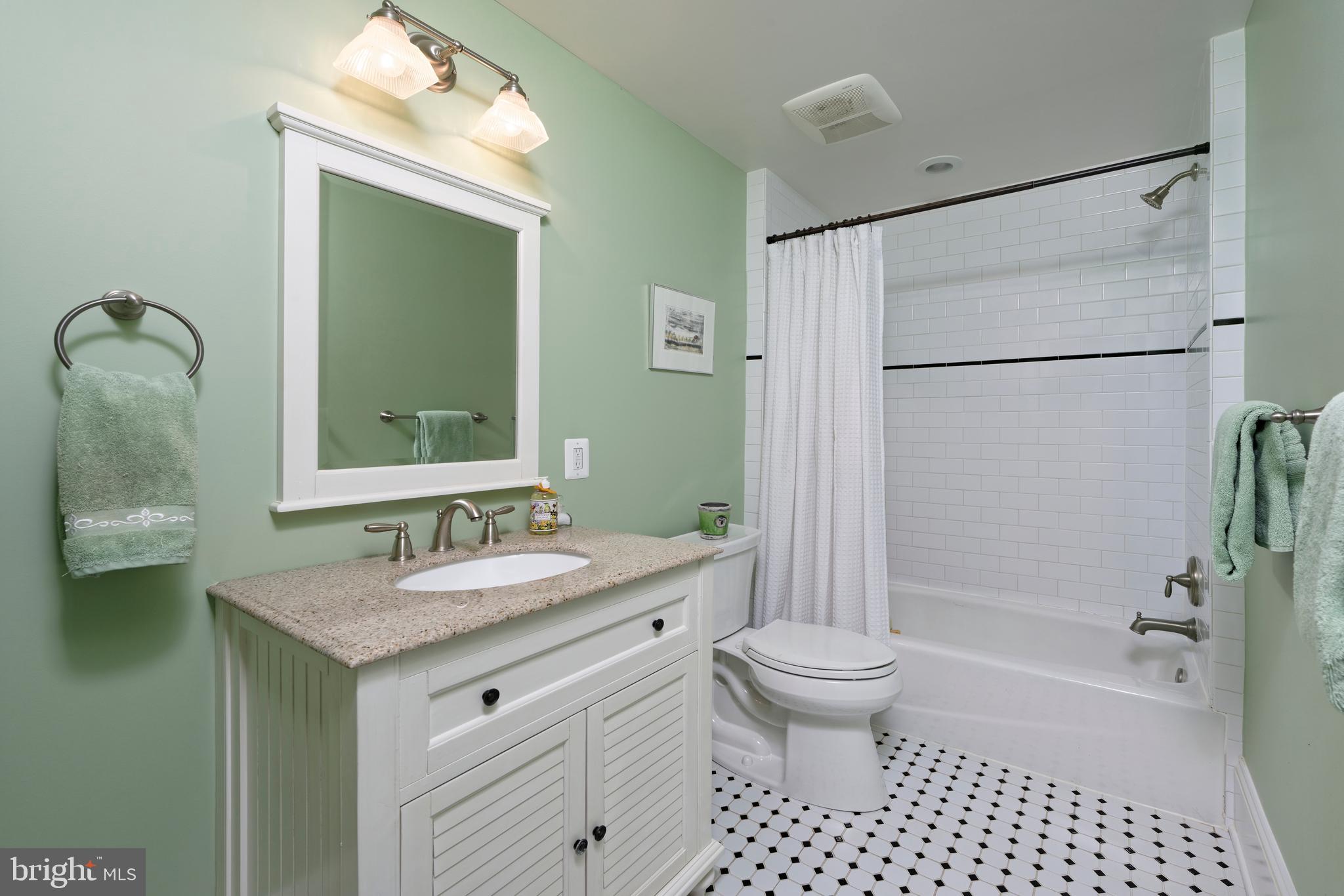 4048 Rectortown Road Marshall, VA 20115 - Photo 23 of 52 a bathroom with a granite countertop sink toilet and shower
