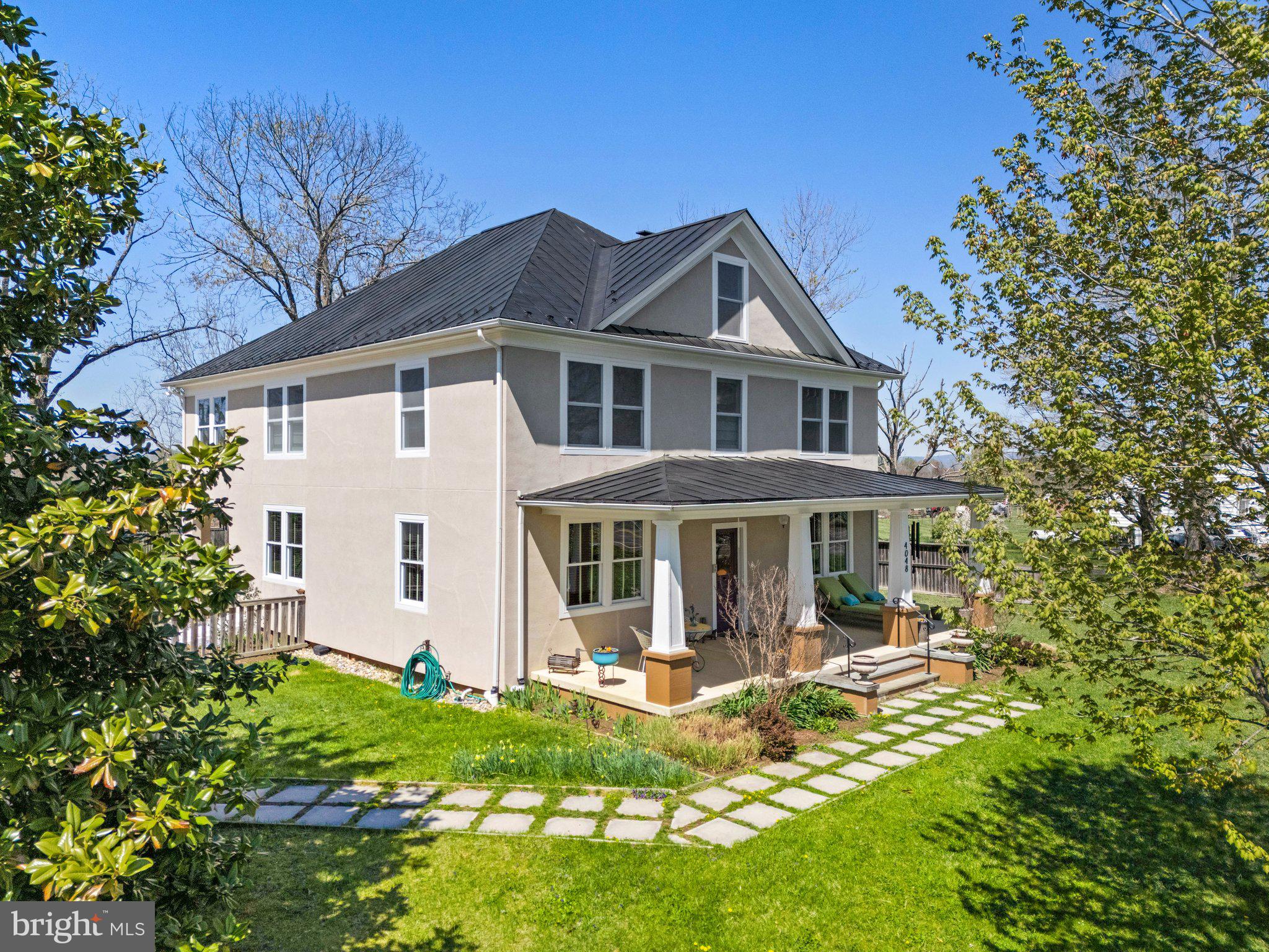 4048 Rectortown Road Marshall, VA 20115 - Photo 4 of 52 a front view of a house with a yard