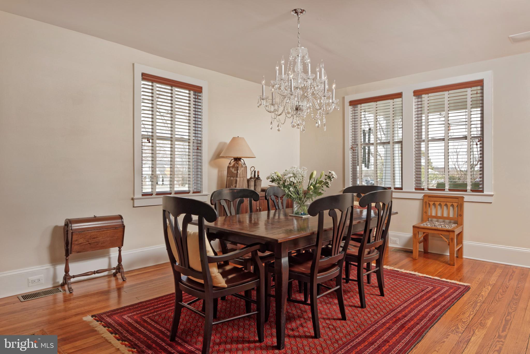 4048 Rectortown Road Marshall, VA 20115 - Photo 9 of 52 a view of a dining room with furniture window chandelier and wooden floor