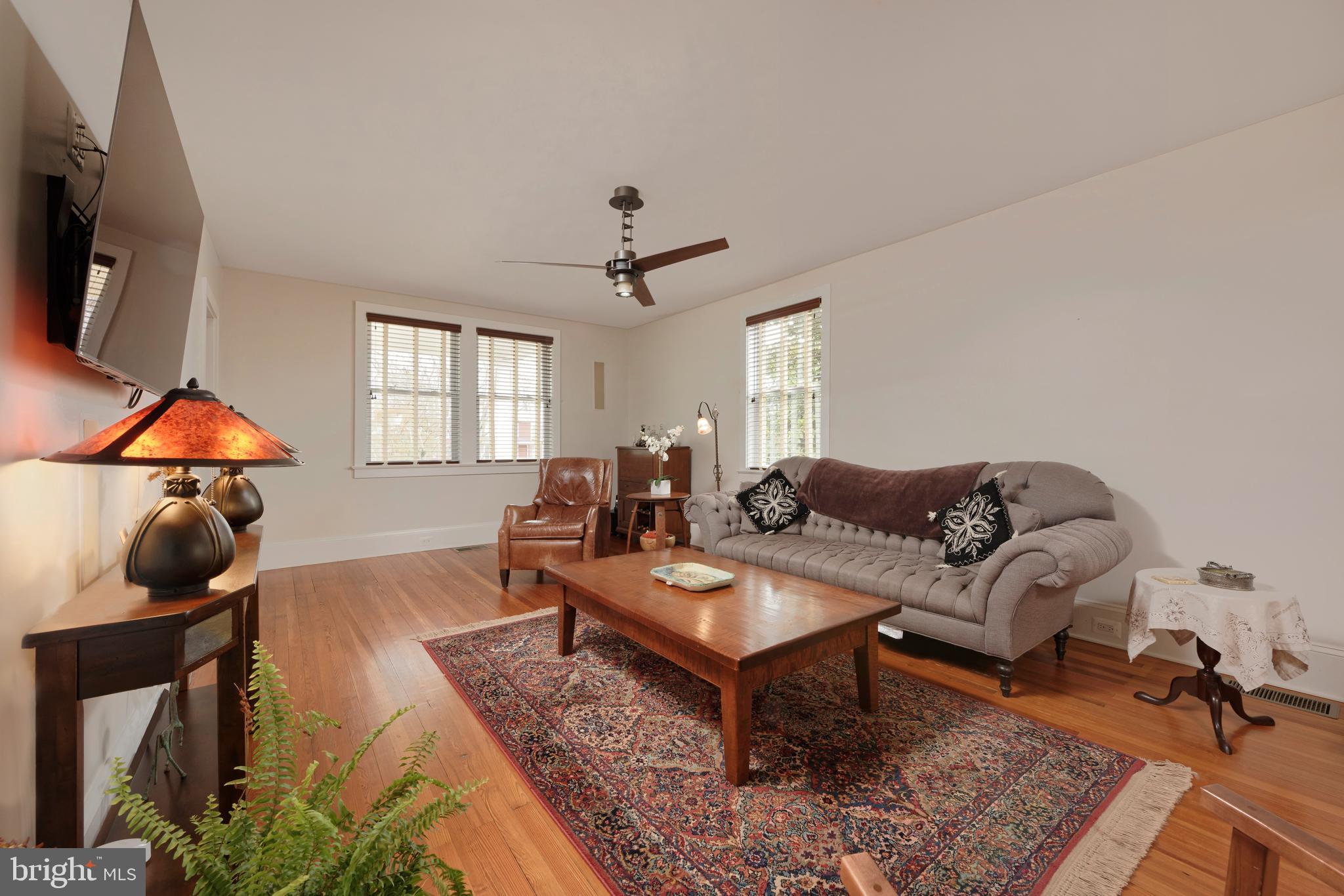 4048 Rectortown Road Marshall, VA 20115 - Photo 10 of 52 a living room with furniture a flat screen tv and a window