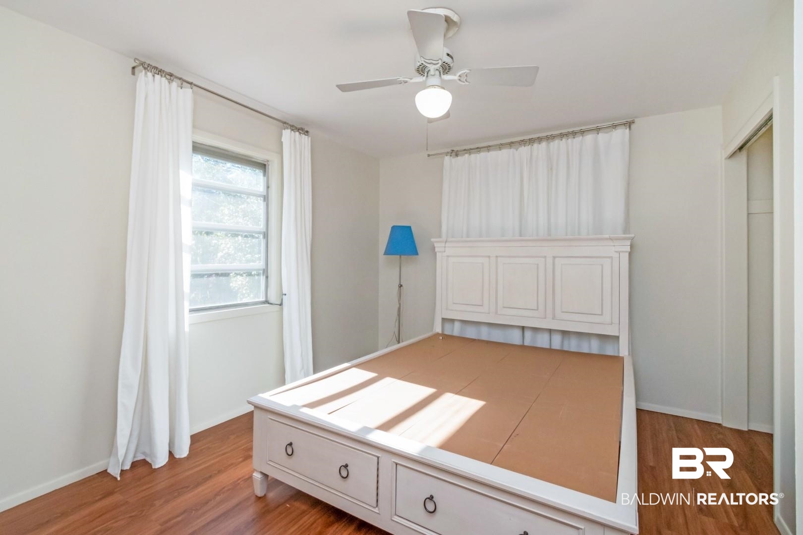 5412 South Norden Drive Mobile, AL 36608 - Photo 23 of 38 Unfurnished bedroom featuring hardwood / wood-style floors and ceiling fan
