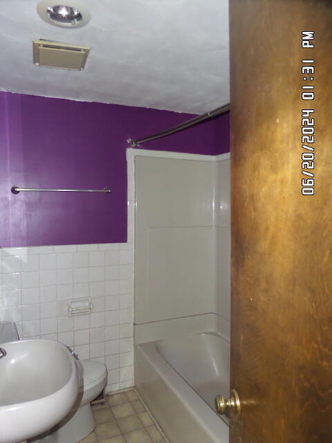 5982 Brethren Road Roanoke, VA 24014 - Photo 8 of 10 a bathroom with a toilet and sink