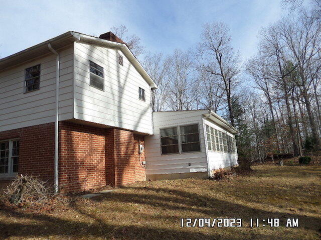 5982 Brethren Road Roanoke, VA 24014 - Photo 9 of 10 a front view of a house with a yard