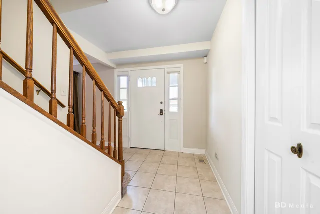 a view of an entryway with staircase