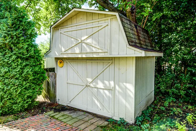 a small cabin with a small yard