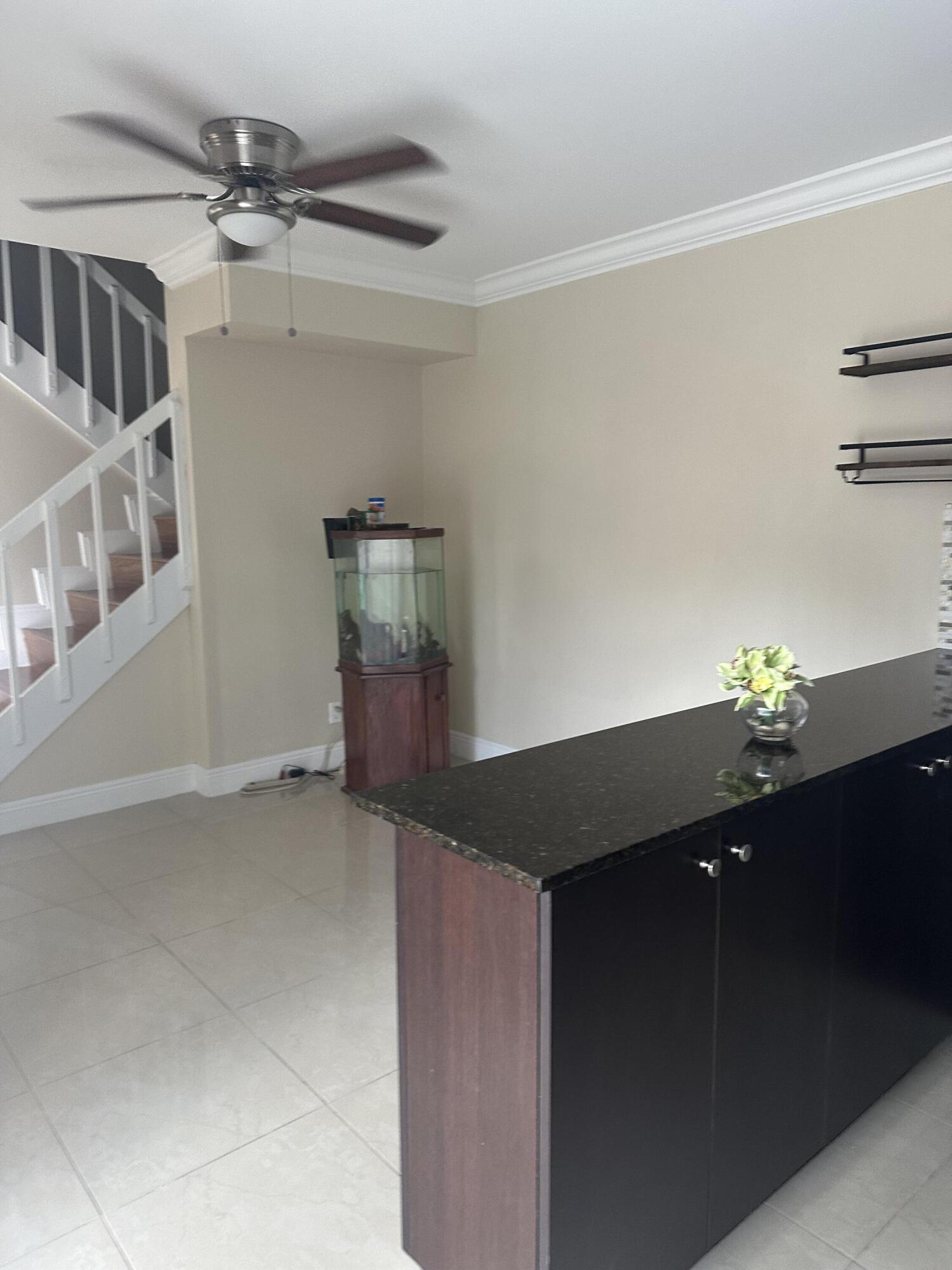 2201 White Pine Circle, Unit B Greenacres, FL 33415 - Photo 5 of 14 a living room with furniture