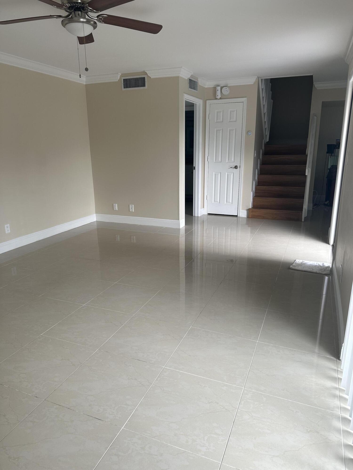 2201 White Pine Circle, Unit B Greenacres, FL 33415 - Photo 6 of 14 a view of a livingroom with a staircase