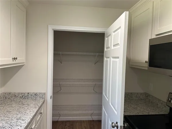 a view of storage and utility room