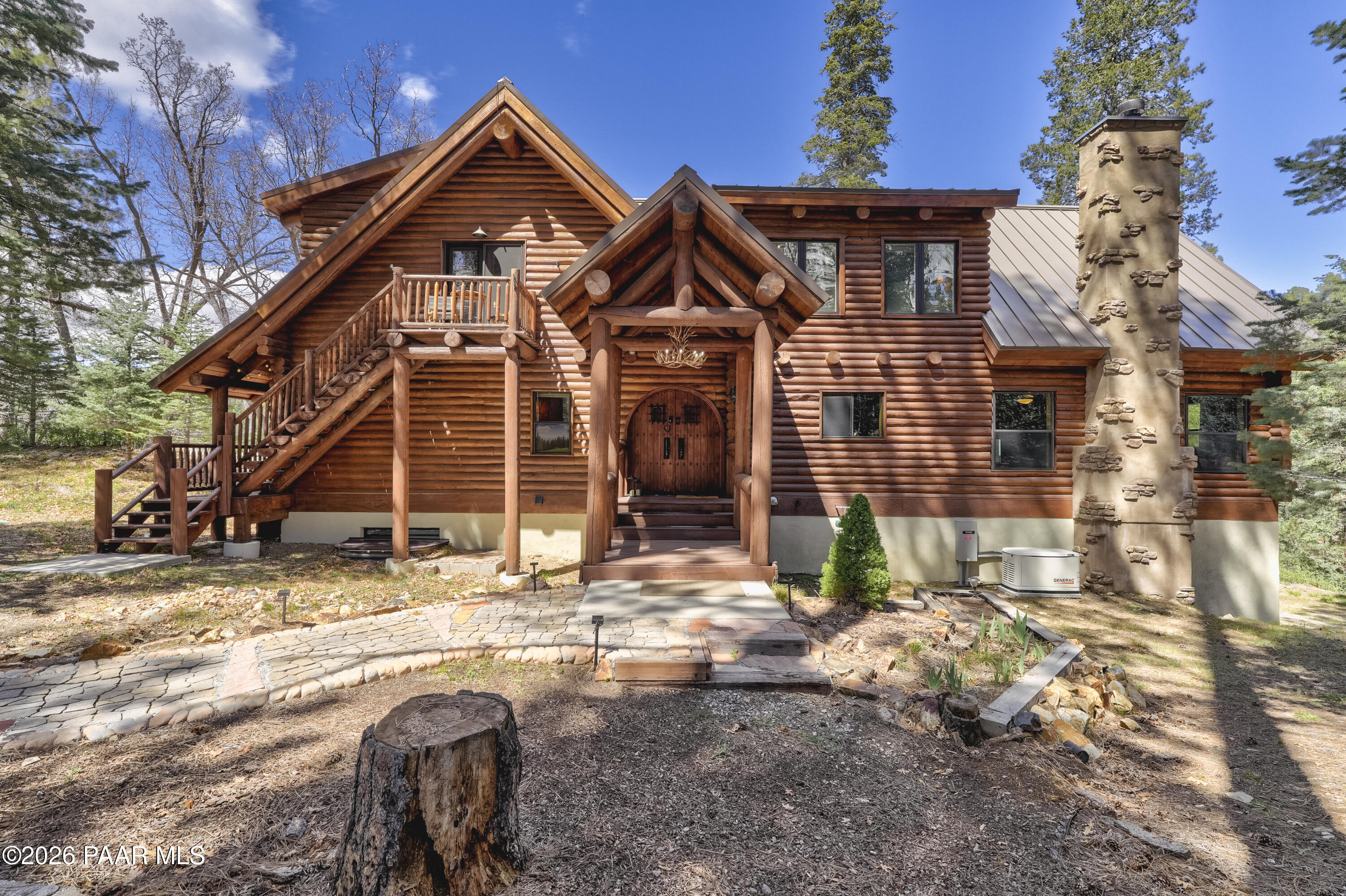 8105 South Comstock Mine Road Prescott, AZ 86303 - Photo 1 of 61 a front view of a house with a yard