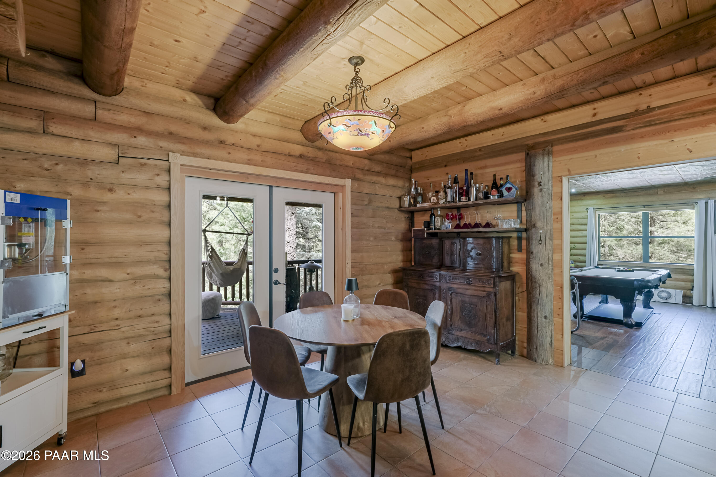 8105 South Comstock Mine Road Prescott, AZ 86303 - Photo 14 of 61 a view of a dining room with furniture window and outside view