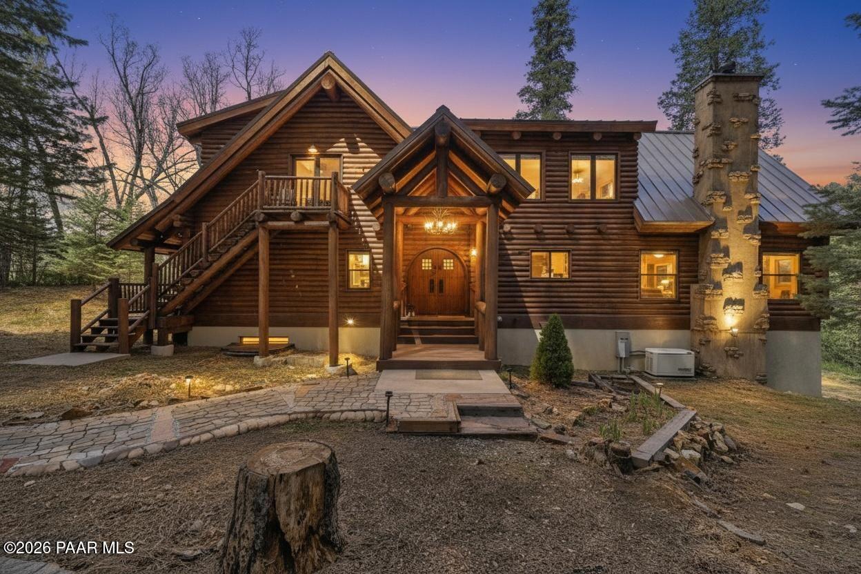 8105 South Comstock Mine Road Prescott, AZ 86303 - Photo 2 of 61 a front view of a house