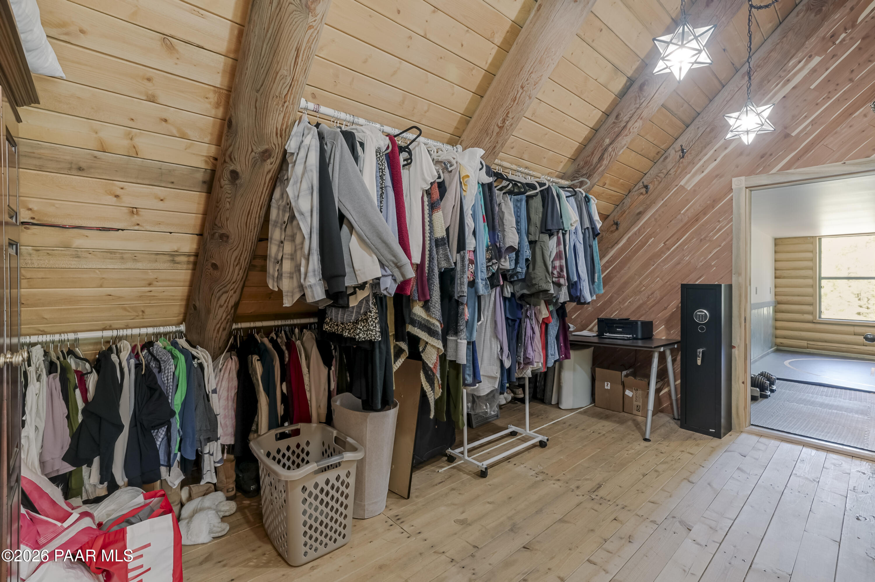 8105 South Comstock Mine Road Prescott, AZ 86303 - Photo 21 of 61 a view of walk in closet with clothes