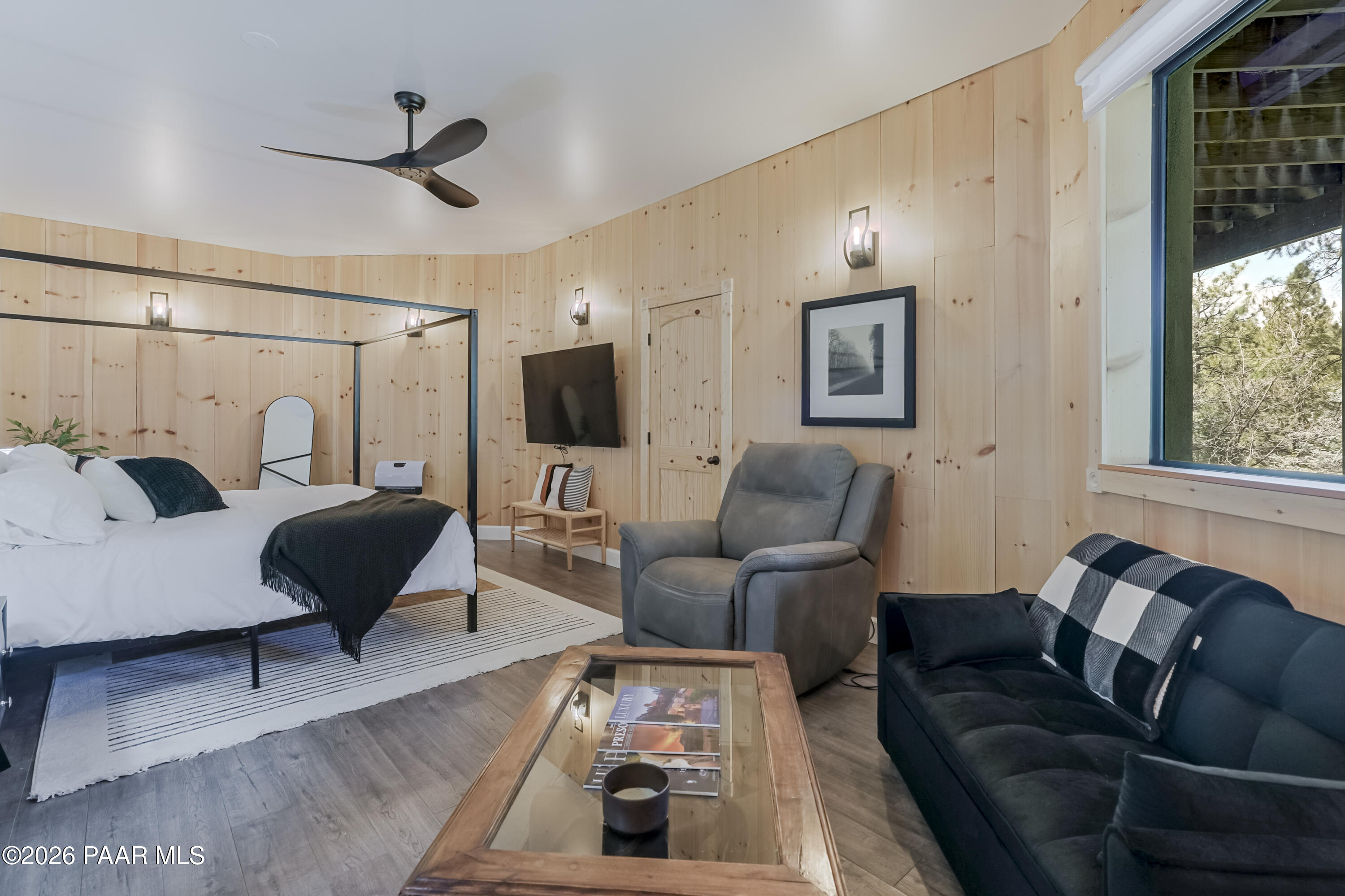 8105 South Comstock Mine Road Prescott, AZ 86303 - Photo 27 of 61 a living room with furniture and a window