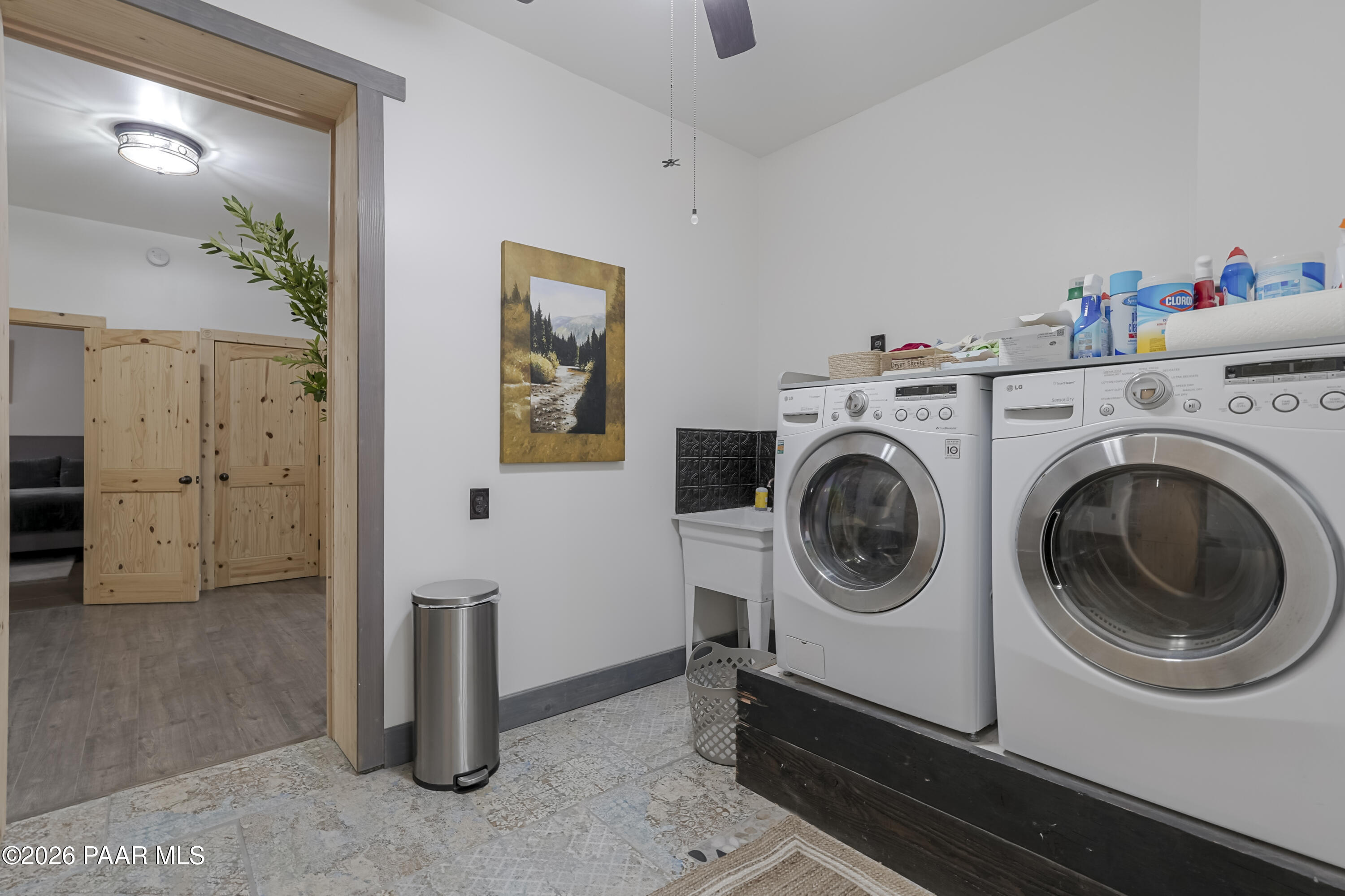8105 South Comstock Mine Road Prescott, AZ 86303 - Photo 36 of 61 a utility room with dryer and washer