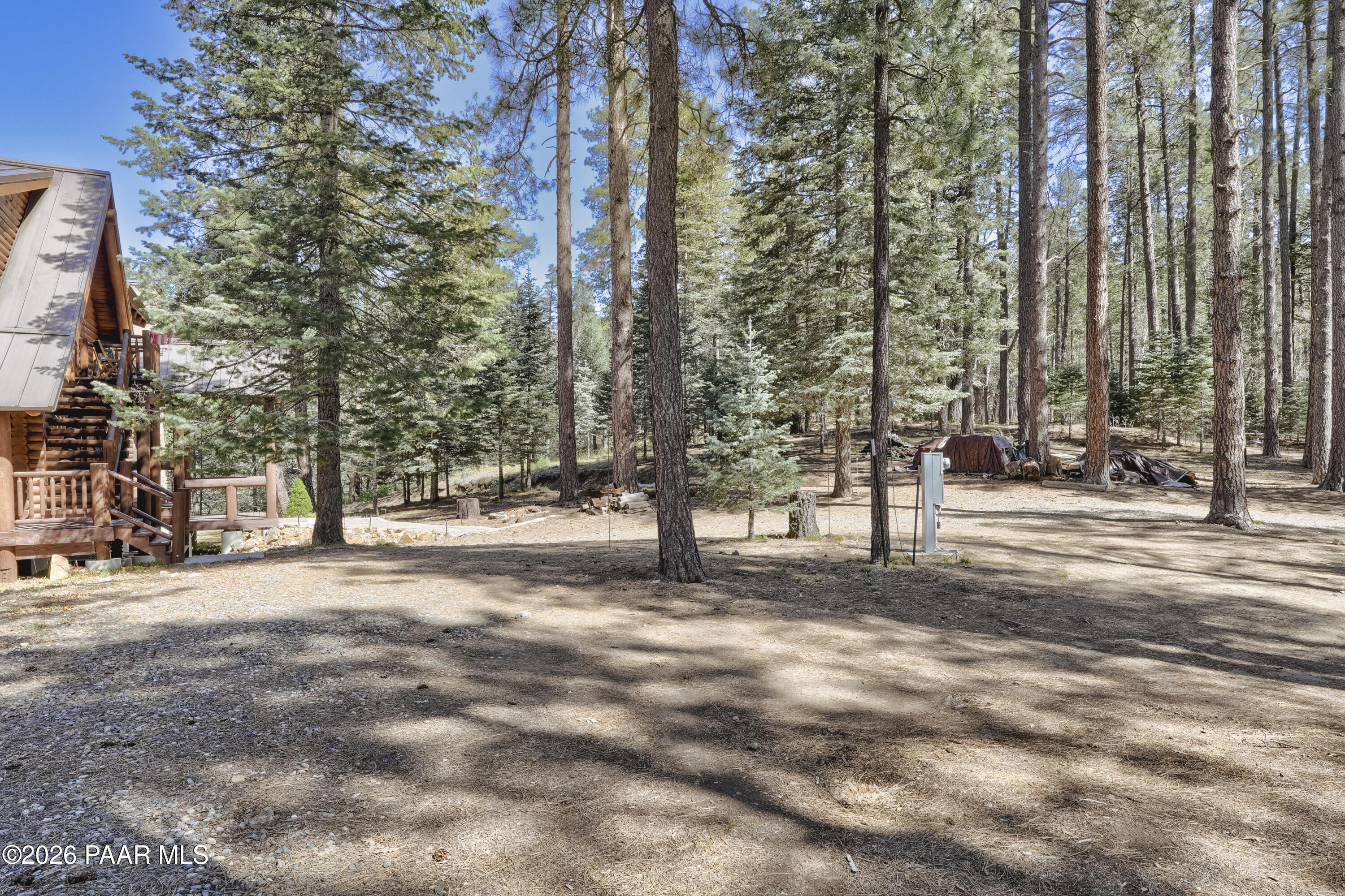 8105 South Comstock Mine Road Prescott, AZ 86303 - Photo 44 of 61 a view of a road with trees