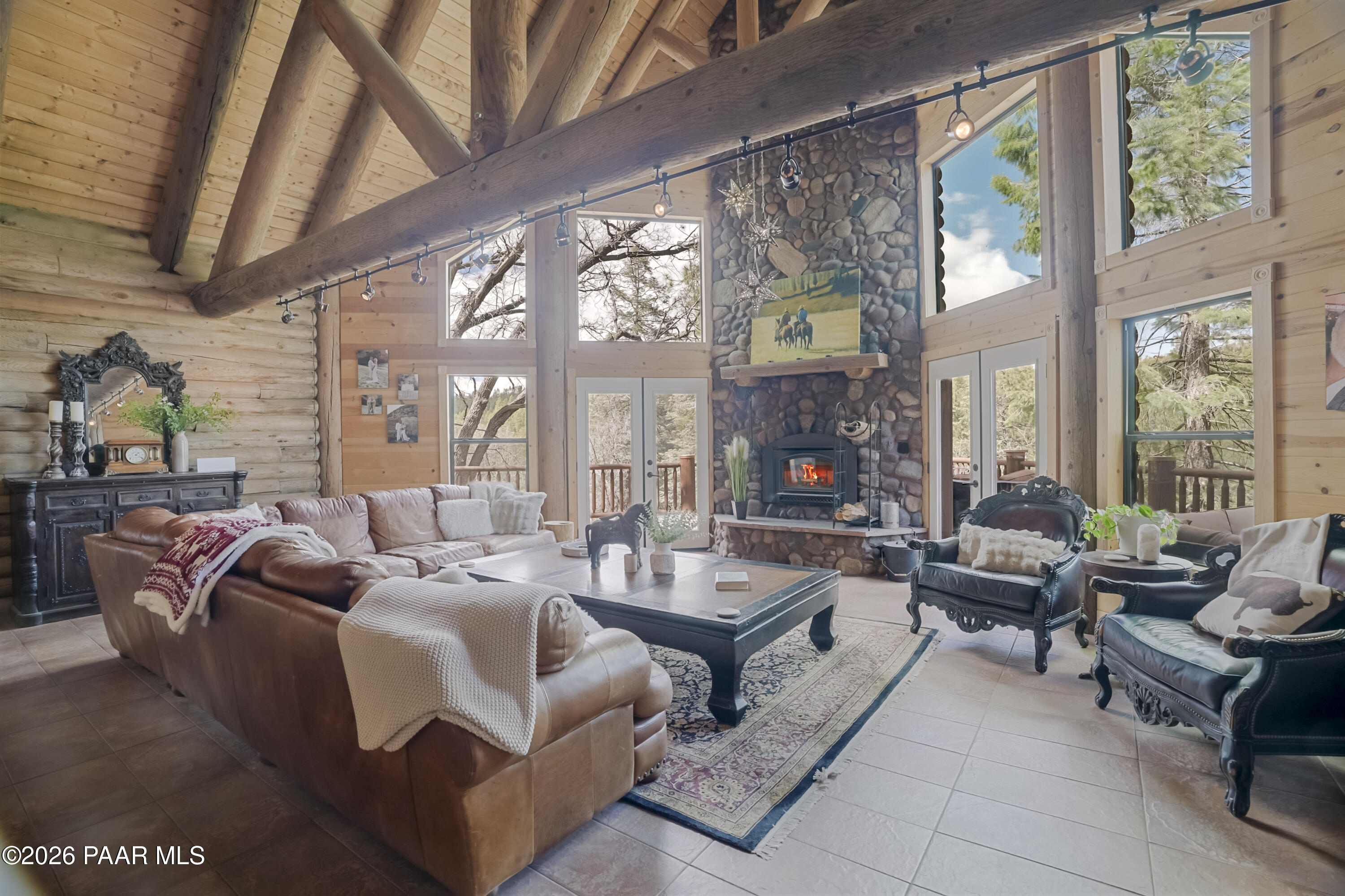 8105 South Comstock Mine Road Prescott, AZ 86303 - Photo 5 of 61 a living room with furniture and large windows