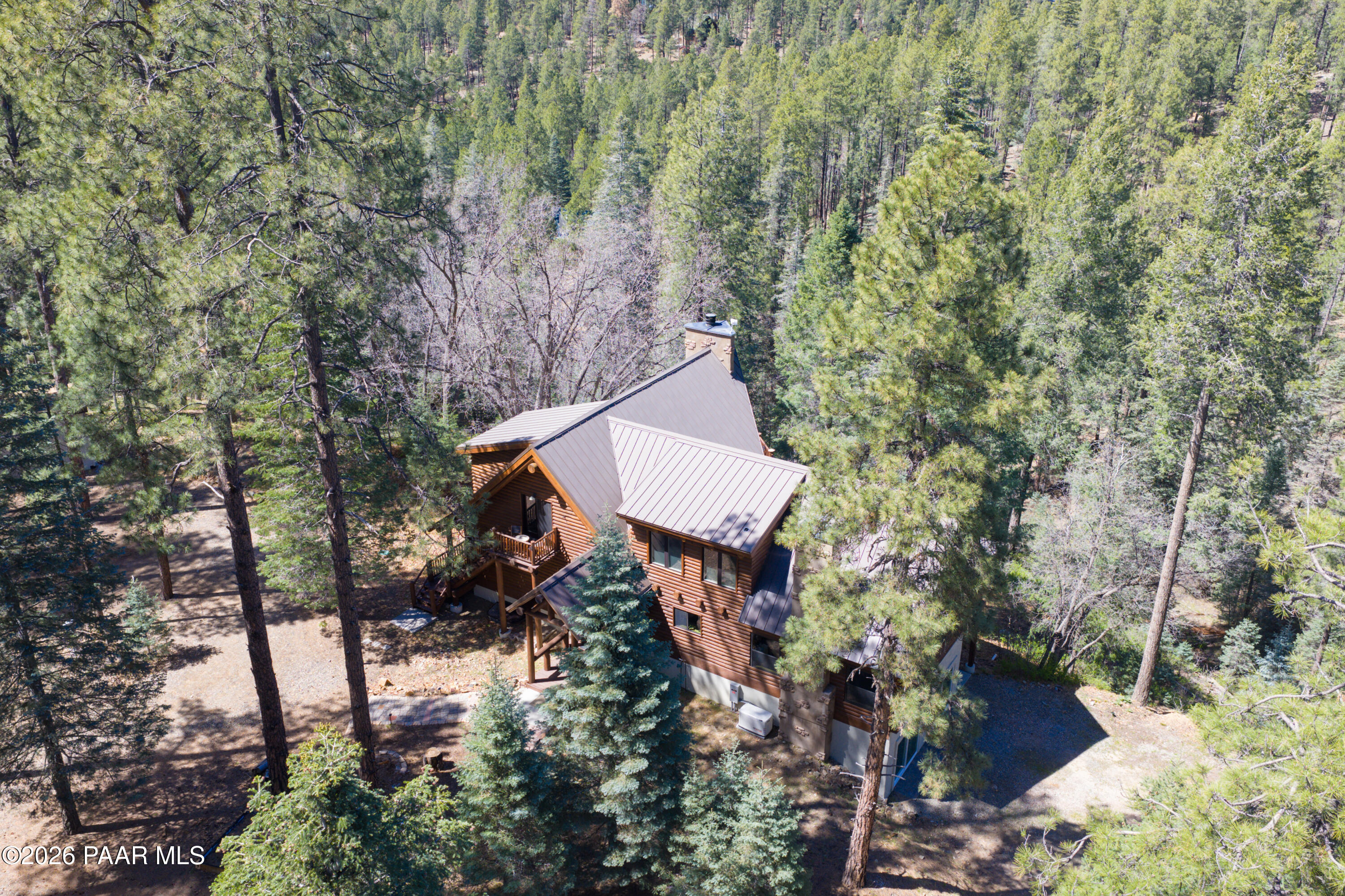 8105 South Comstock Mine Road Prescott, AZ 86303 - Photo 53 of 61 a backyard of a house with lots of green space