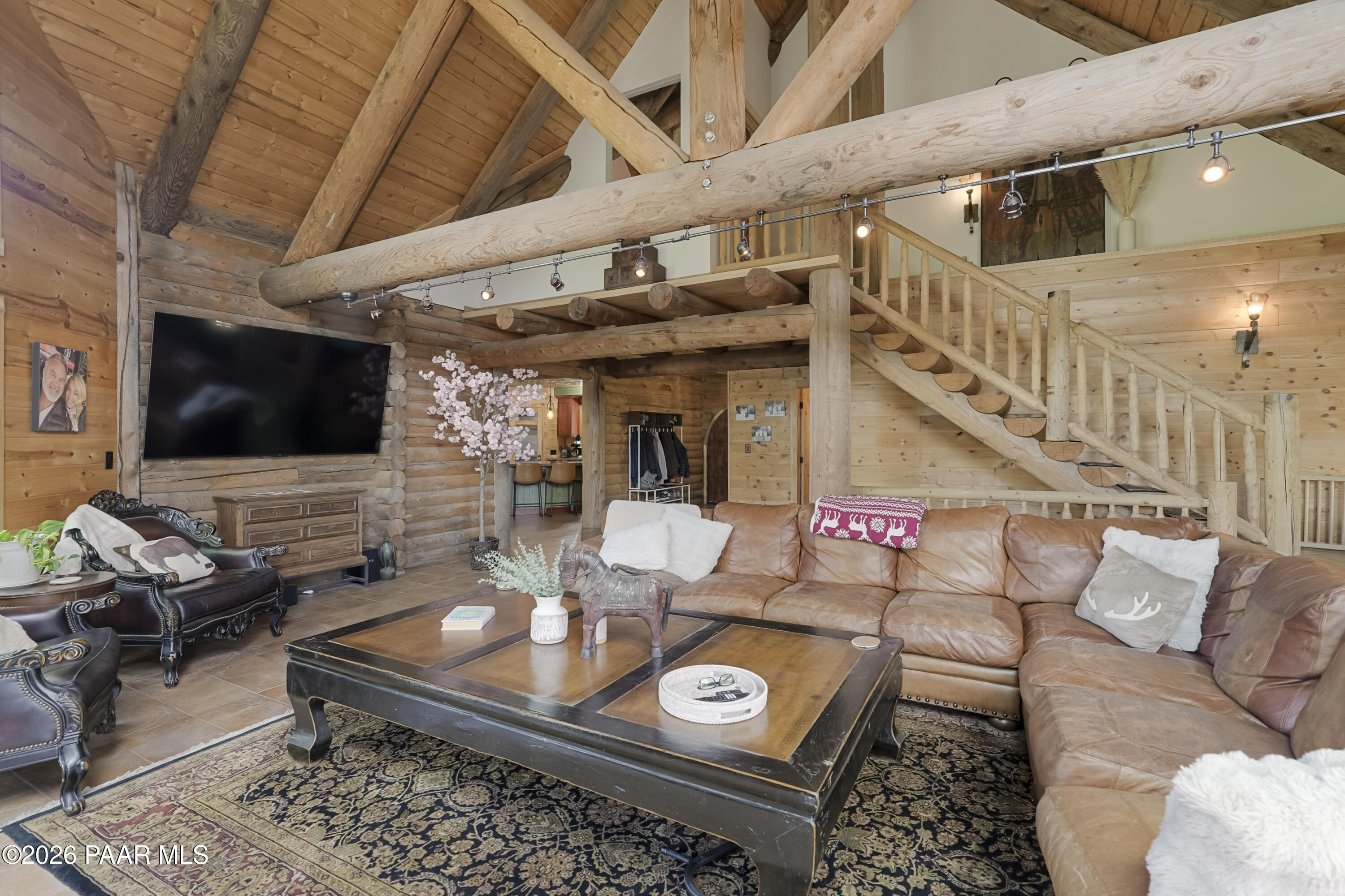 8105 South Comstock Mine Road Prescott, AZ 86303 - Photo 7 of 61 a living room with furniture and a flat screen tv