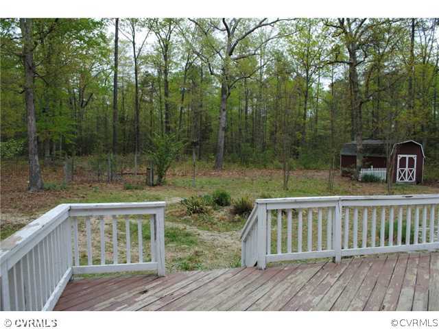 13620 Spring Run Road Midlothian, VA 23112 - Photo 13 of 15 a balcony with wooden floor and yard