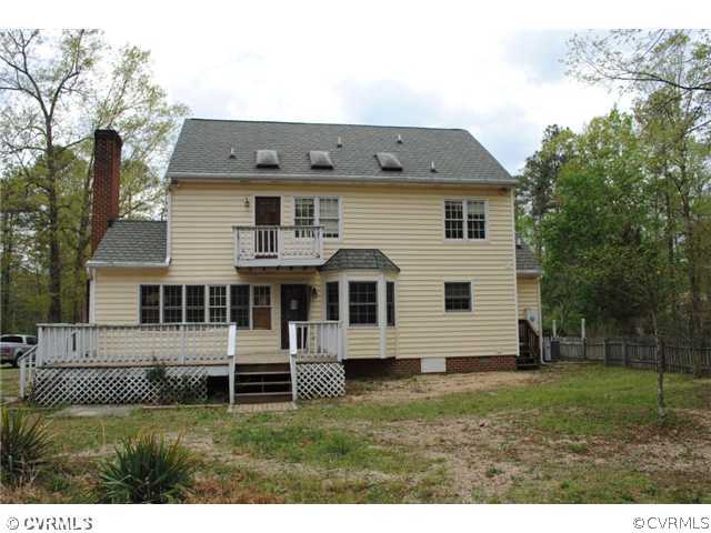 13620 Spring Run Road Midlothian, VA 23112 - Photo 15 of 15 a view of front of house with a yard