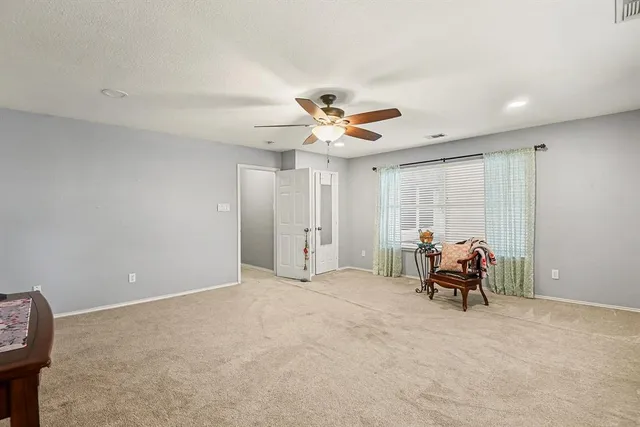 a view of a livingroom with furniture