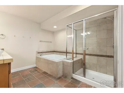 a view of an empty room with stairs and stairs