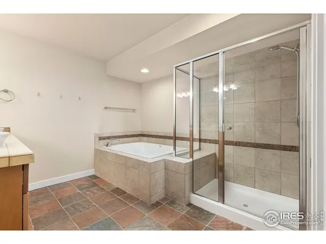 a view of an empty room with stairs and stairs