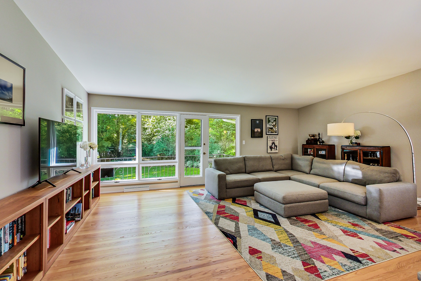 416 Maple Street Winnetka, IL 60093 - Photo 13 of 34 a living room with furniture and a flat screen tv