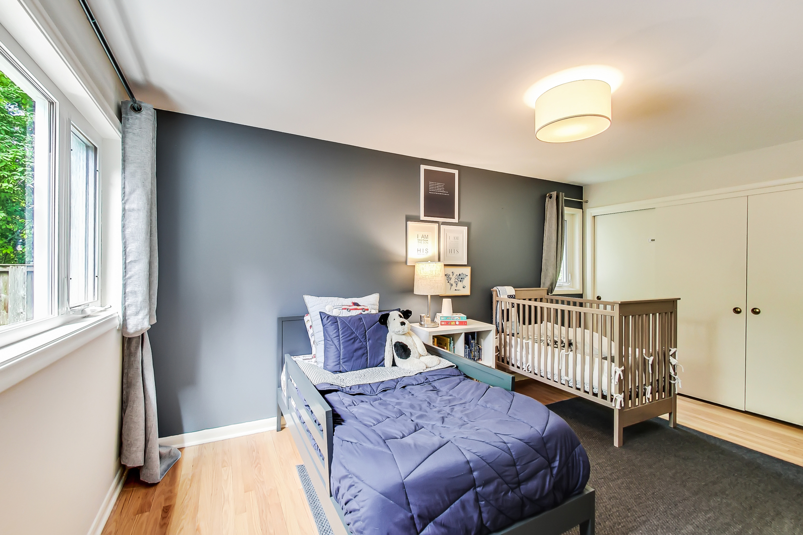 416 Maple Street Winnetka, IL 60093 - Photo 20 of 34 a bedroom with furniture and a window