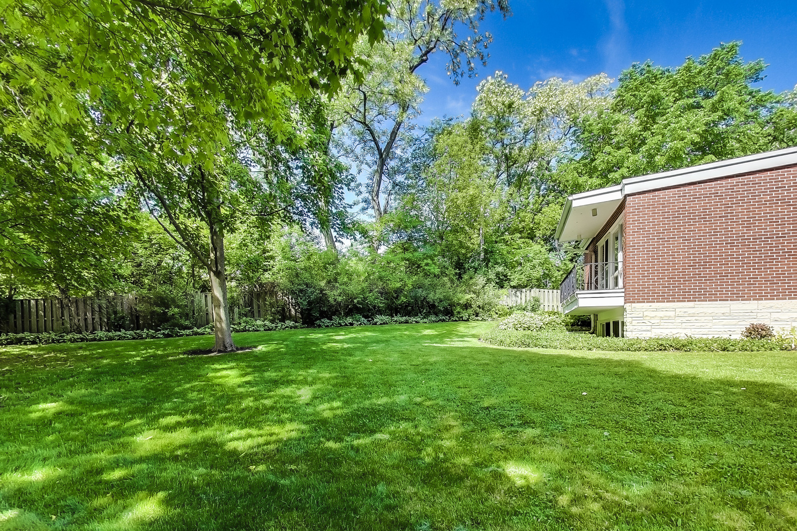 416 Maple Street Winnetka, IL 60093 - Photo 31 of 34 a view of a backyard with a garden