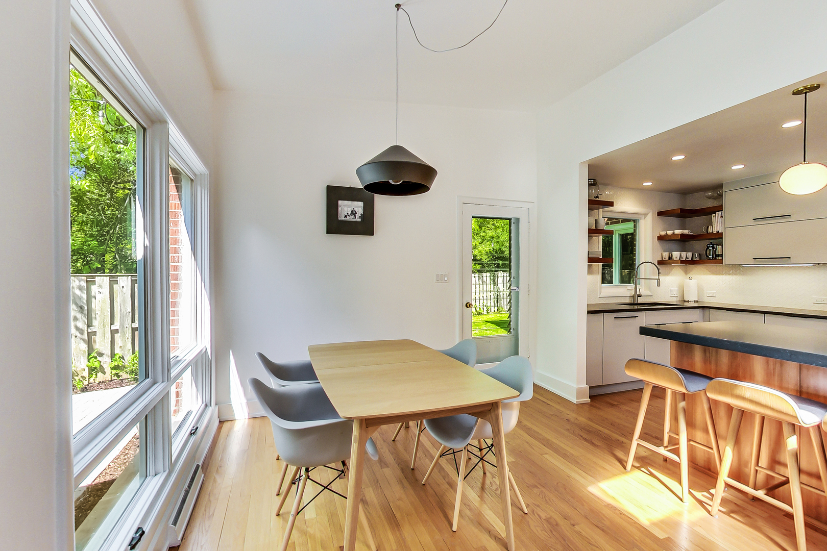 416 Maple Street Winnetka, IL 60093 - Photo 7 of 34 a view of a dining room with furniture window and outside view