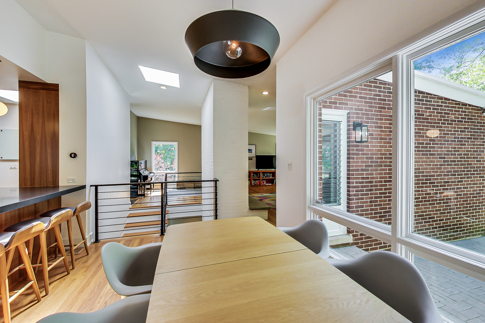 416 Maple Street Winnetka, IL 60093 - Photo 8 of 34 a bedroom with furniture and a large window