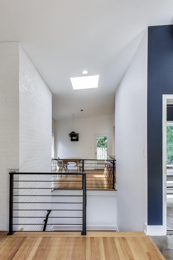 416 Maple Street Winnetka, IL 60093 - Photo 9 of 34 a view of a hallway view with staircase