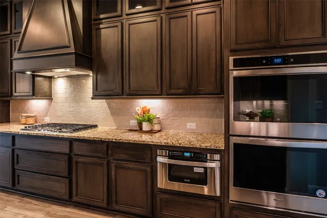 an aerial view of a house with a big yard