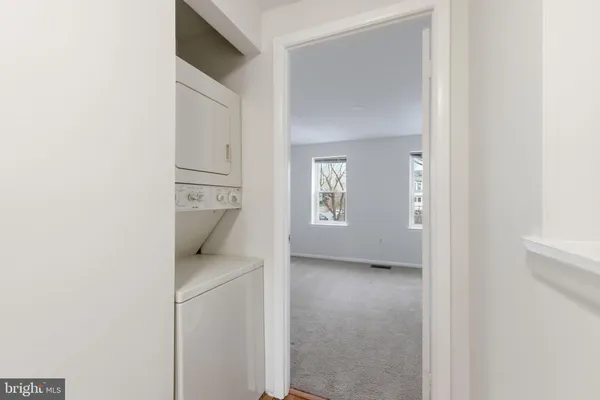 a view of walk in closet with window