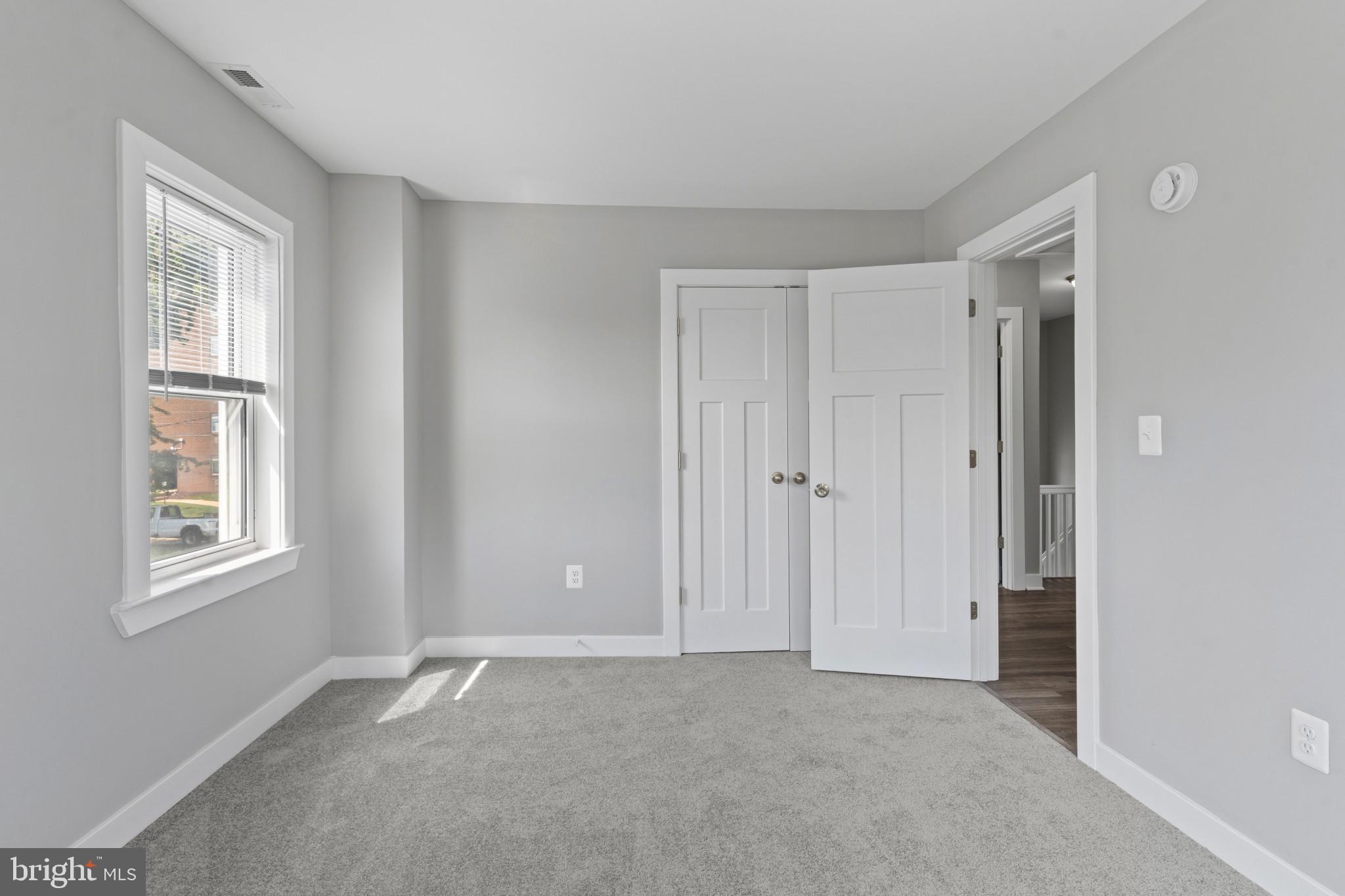 5728 Clover Road Baltimore, MD 21215 - Photo 27 of 40 a view of an empty room with window